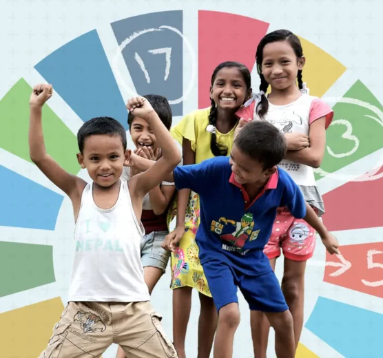 Global Health Progress campaign image - a group of children in front of the SDG wheel